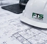 FTS DC TechWorks hard hat resting on project drawings